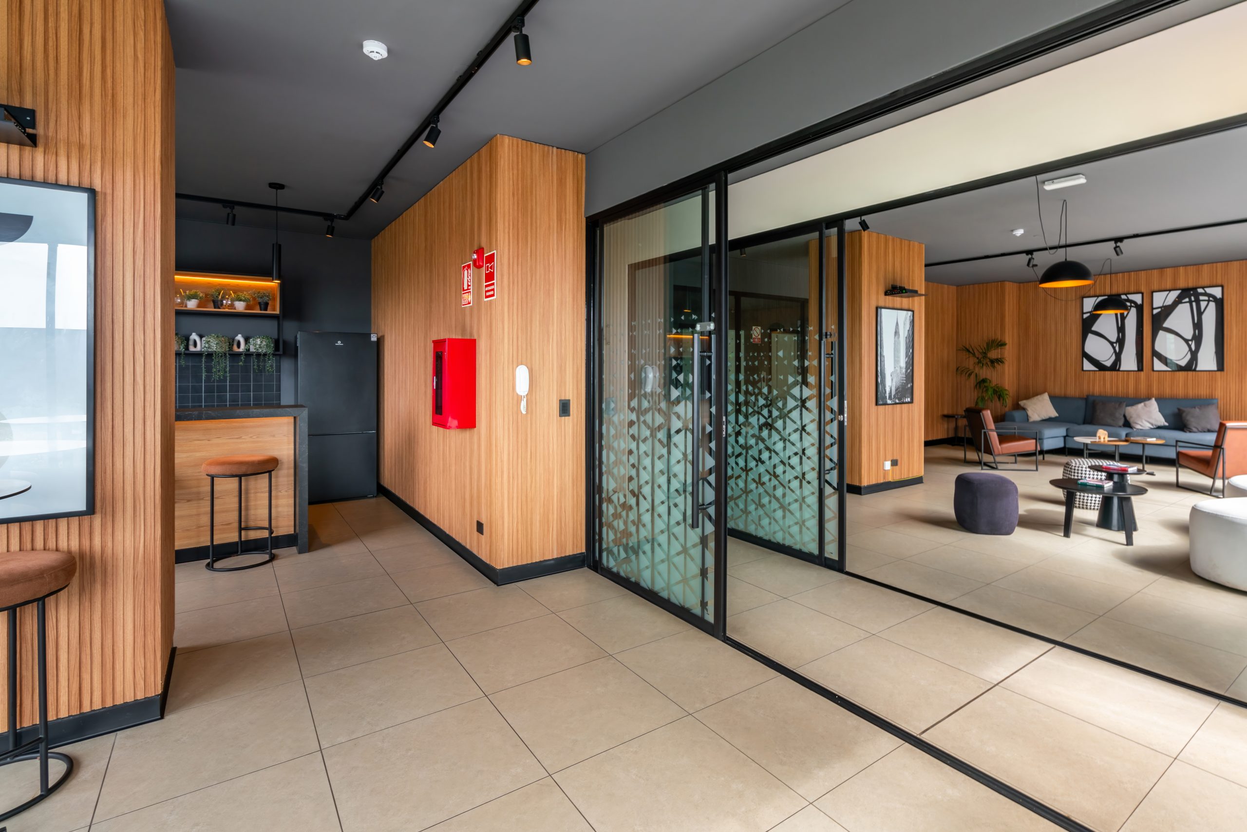 Shared lounge and bar area in the AUREN building